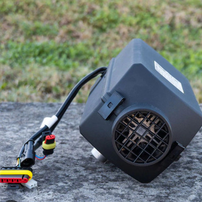 Black electronic device with connectors on a stone surface